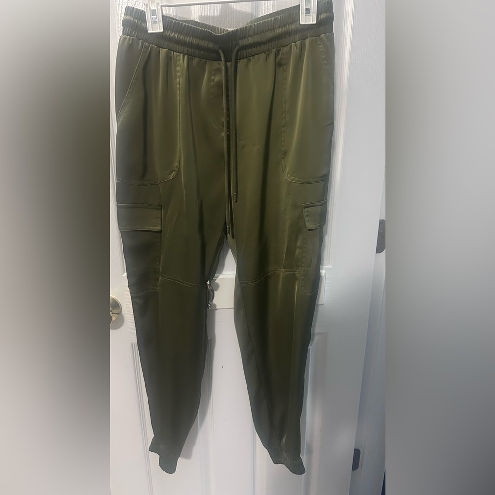Olive green “satin” feel pants.